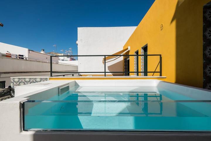 Ferienwohnung für 4 Personen, mit Garten und Ausblick sowie Pool in Sevilla