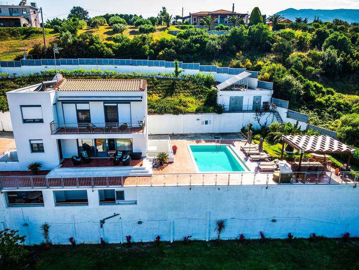 Casa vacanza per 9 persone, con Balcone e Terrazza nonché Giardino e Piscina a Skiathos