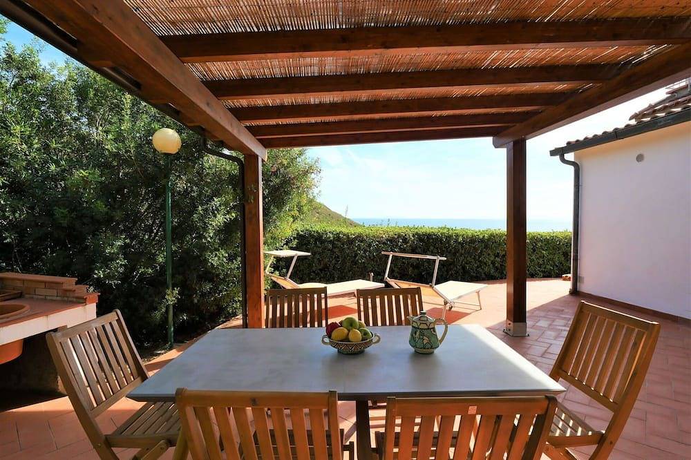 Bellissimo appartamento in villa per 3 ospiti con Wifi, Tv, patio e animali ammessi in Innamorata, Isola d'Elba