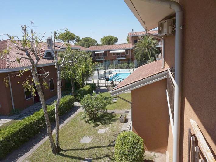 Ferienhaus für 7 Personen, mit Ausblick und Terrasse sowie Pool und Garten in Lignano Sabbiadoro