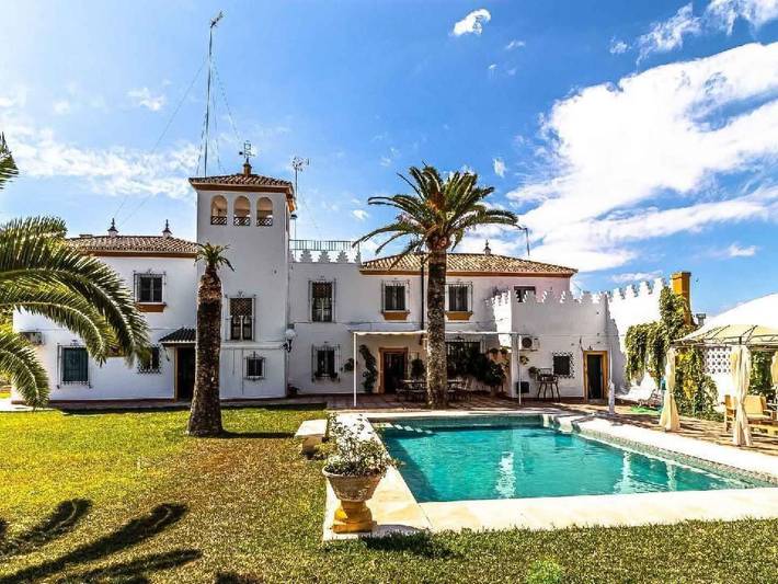 Casa rural para 14 personas, con jardín en Marchena
