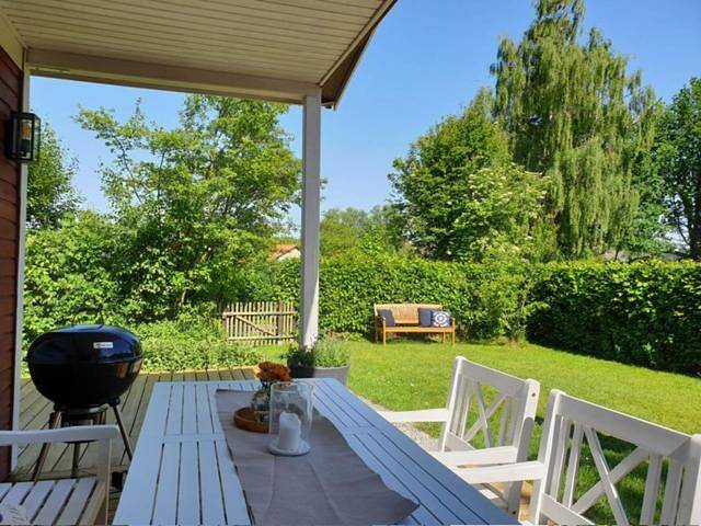 Ferienhaus Grosses Meer mit Ruderboot in Südbrookmerland