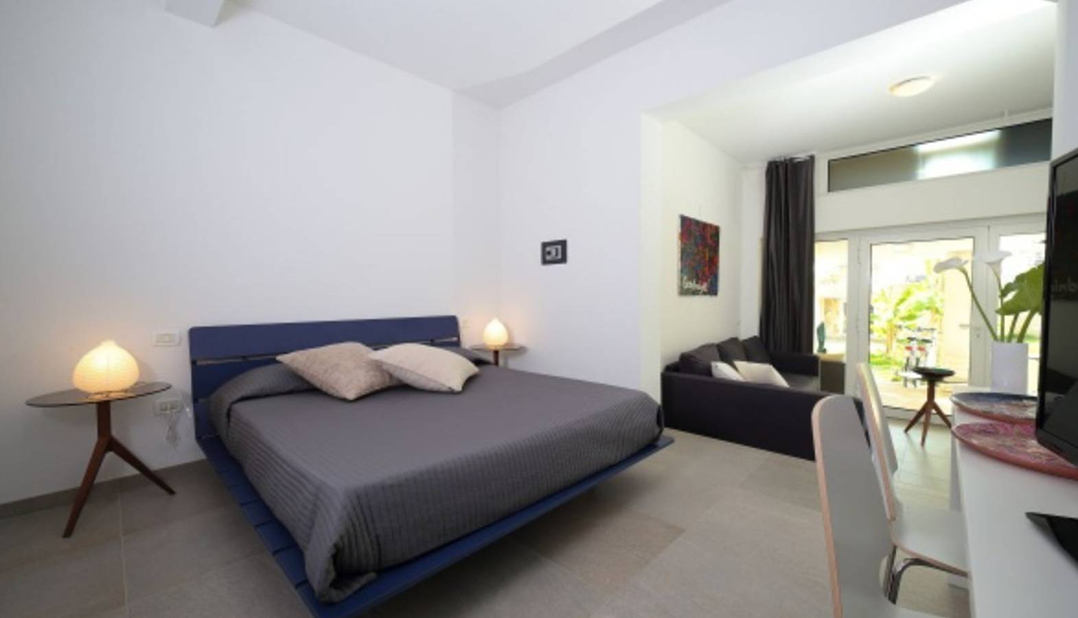 Chambre d'hôtes Loggia degli Artisti 'Deluxe Room Two' avec piscine partagée et climatisation in Palazzolo dello Stella, Province d'Udine