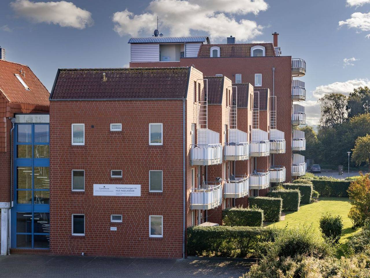 Ganze Ferienwohnung, Hus Inselkieker - Familienfreundliche Ferienwohnung an der Nordsee mit Balkon und Blick zum Deich in Schillig Strand, Wangerland