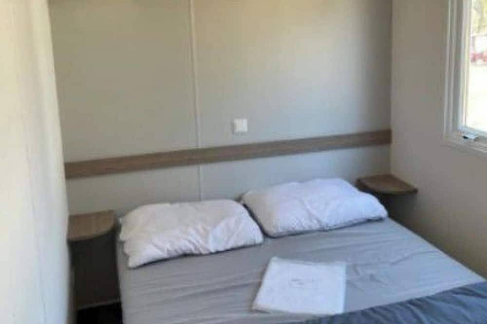 Mobil home confortable avec terrasse pour 4 personnes in Graissac, Argences en Aubrac