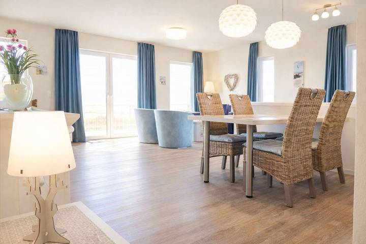 Ferienwohnung für 4 Personen, mit Balkon und Sauna sowie Ausblick in Schillig