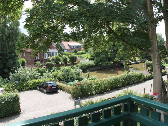 Ferienwohnung für 4 Personen, mit Balkon und Terrasse sowie Ausblick in Krummhörn
