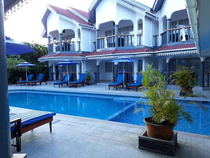 Hôtel pour 4 personnes, avec piscine ainsi que jardin et vue aux Seychelles