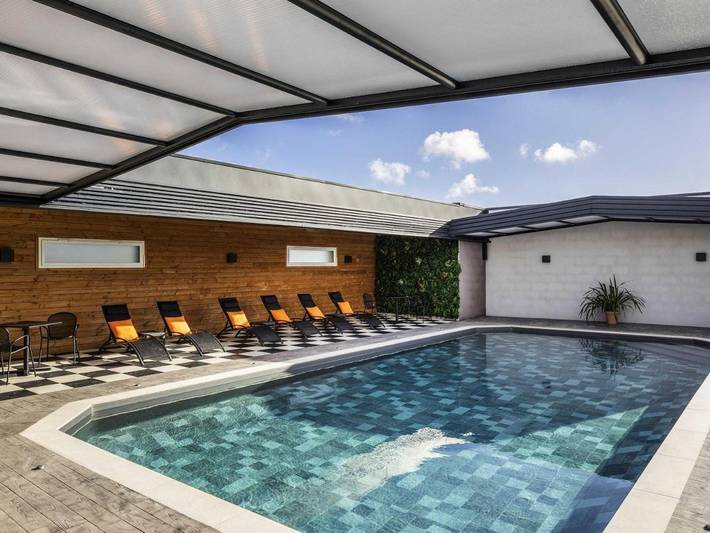 Hôtel pour 2 personnes, avec terrasse ainsi que piscine et sauna, animaux acceptés à Trignac