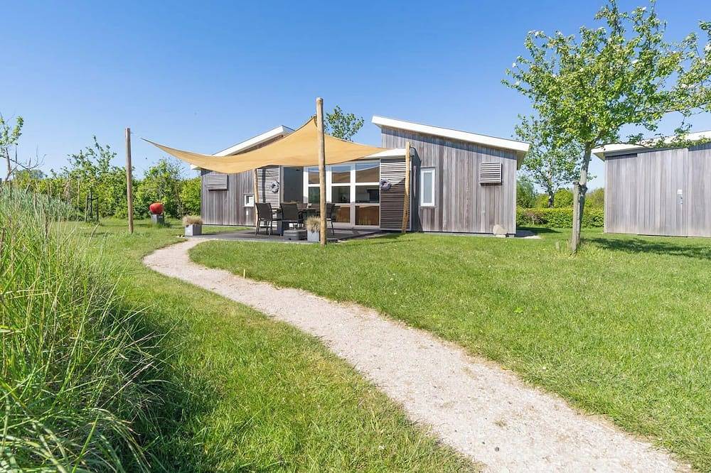Dieses Chalet liegt am Rande des Parks (mit Blick auf den Pool) und ist komplett ausgestattet. Die s in Burgh-Haamstede, Zeeuwse Kust