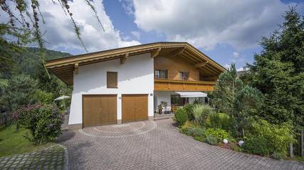 Gîte pour 5 personnes, avec jardin ainsi que terrasse et vue, adapté aux familles à Walchsee