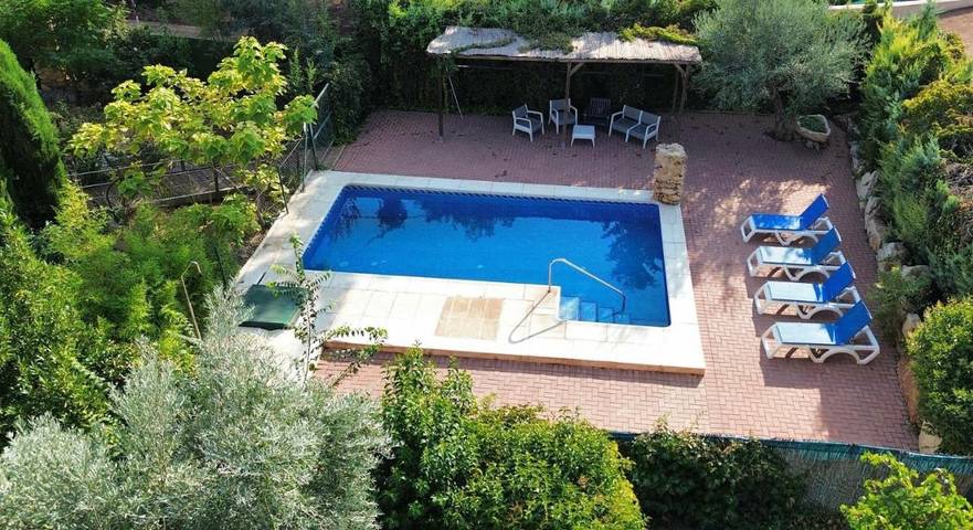 Casa de vacaciones para 8 personas, con jardín y vistas al lago además de vistas y piscina, Se admiten mascotas en Parque natural de las Lagunas de Ruidera - 2