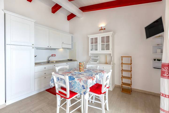Appartamento intero, Appartamento 'Incanto Sul Mare' con Veranda Vista Mare e Aria Condizionata in Isola Rossa, Trinità d'Agultu e Vignola