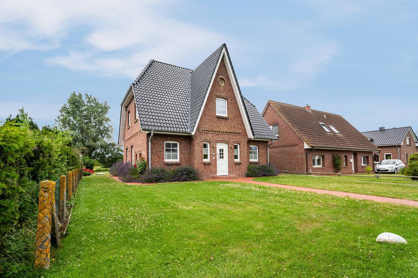 Ferienhaus Süderhus auf Nordstrand, Friesenhaus mit Garten, Terrasse, Wallbox und Wlan in Nordstrand (Gemeinde), Nordstrand