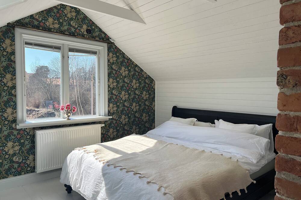 Semi-detached house near the sea, Gotland ferry and archipelago boats in Nynäshamn