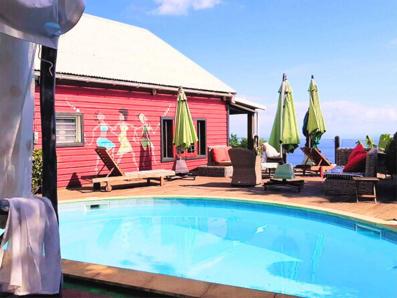 Helles Bungalow in Saint Leu nahe dem Meer mit Gemeinschaftspool in Saint-Leu, La Réunion