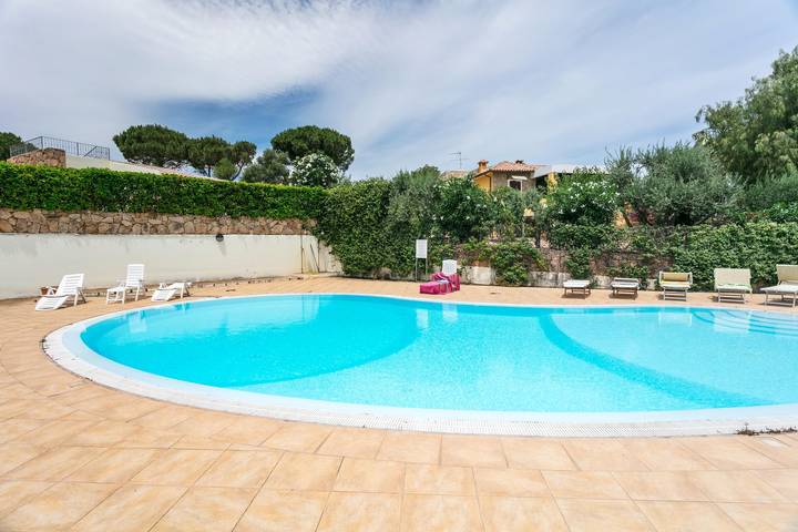 Holiday Home “Villetta Bianca” with Terraces & Shared Pool in Porto San Paolo, Loiri Porto San Paolo