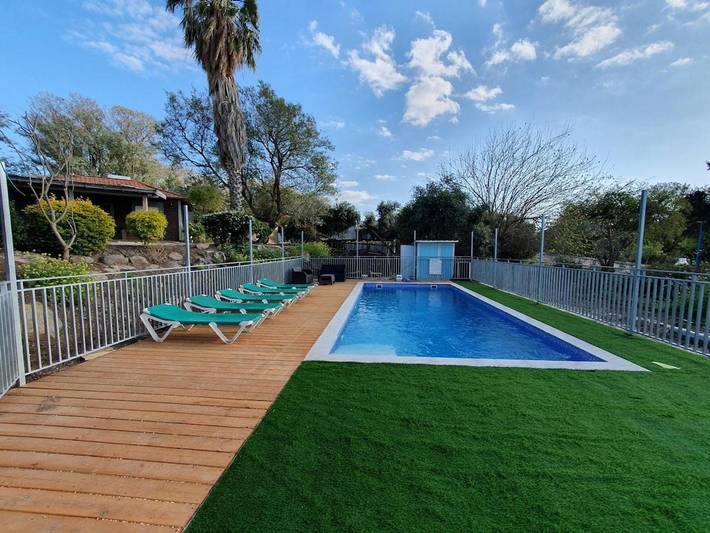 Appartement de vacances pour 7 personnes, avec piscine et vue sur le lac ainsi que vue et jardin, animaux acceptés