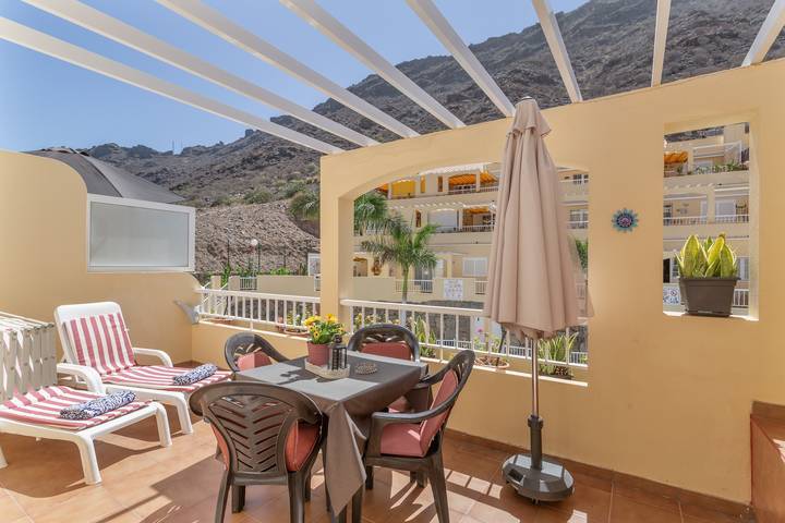 Apartamento entero, Vacaciones 'Los Mangueros Beach 6 - Mogán' con vistas a la montaña, Wi-Fi y aire acondicionado in Puerto de Mogan, Mogán