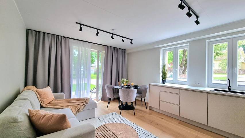 Appartement de vacances pour 5 personnes, avec terrasse ainsi que jardin et vue