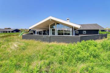 Ferienhaus für 8 Personen, mit Whirlpool und Sauna sowie Terrasse, mit Haustier in Henne Strand