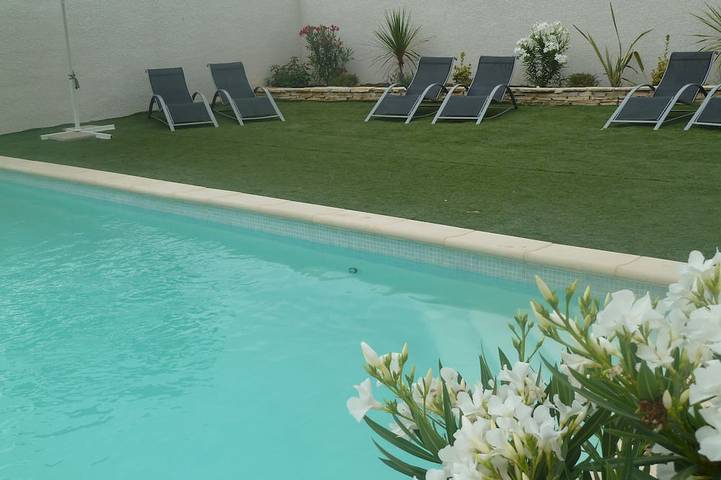 Appartement de vacances pour 5 personnes, avec piscine ainsi que jardin et terrasse, animaux acceptés