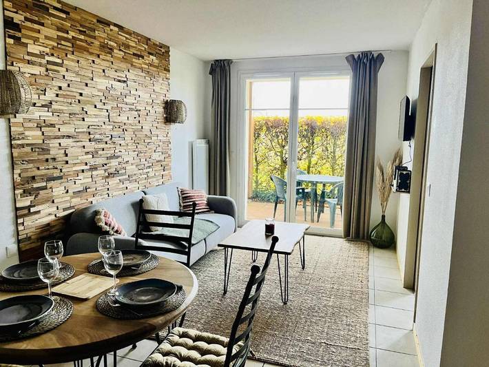 Appartement de vacances pour 4 personnes, avec Terrasse et Jardin ainsi que Piscine et Sauna