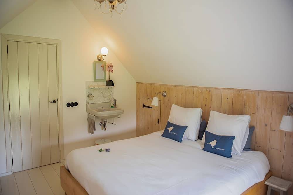 Idyllisch huisje met hottub, houtkachel en tuin in Lage Mierde, Noord-Brabant