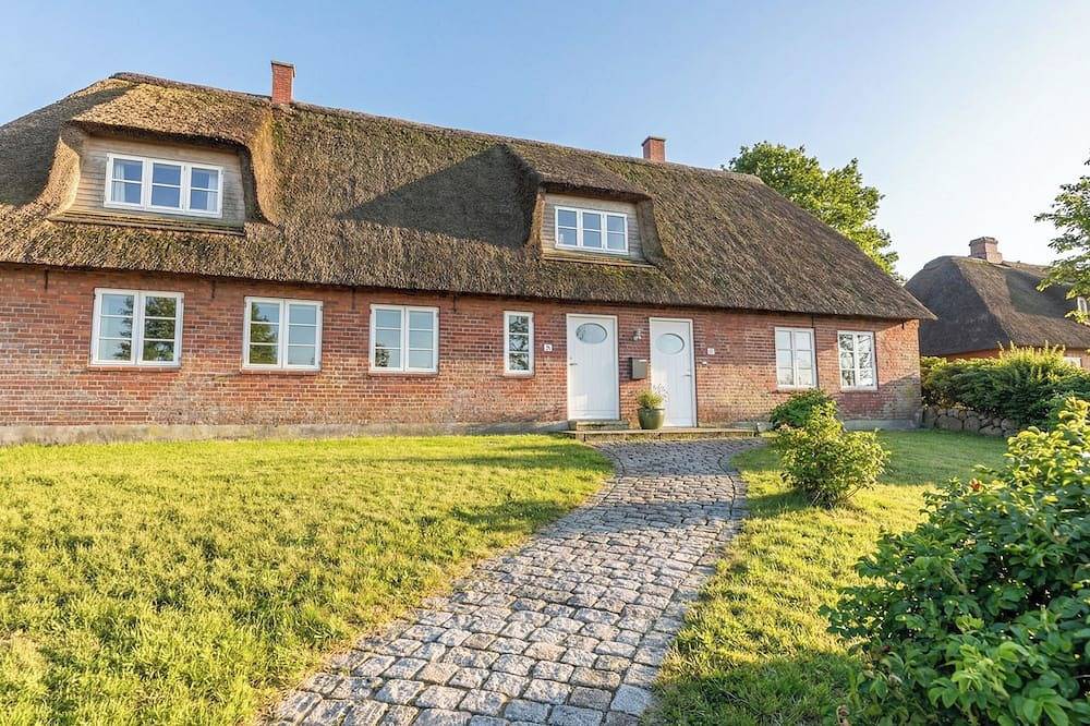 Schleusenwärter Luv: Ferienhaus mit Sauna, Kaminofen & Terrasse für bis zu 6 Gäs in Neukirchen (Nordfriesland), Nordfriesland
