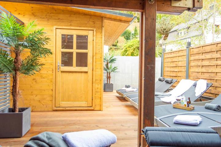 Ferienwohnung für 8 Personen, mit Terrasse und Garten sowie Sauna und Ausblick