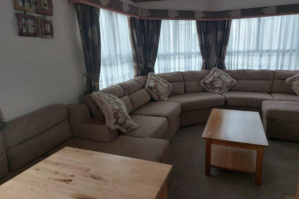 Cosy caravan with side decking at Felixstowe Beach Holiday Park in Felixstowe, Suffolk