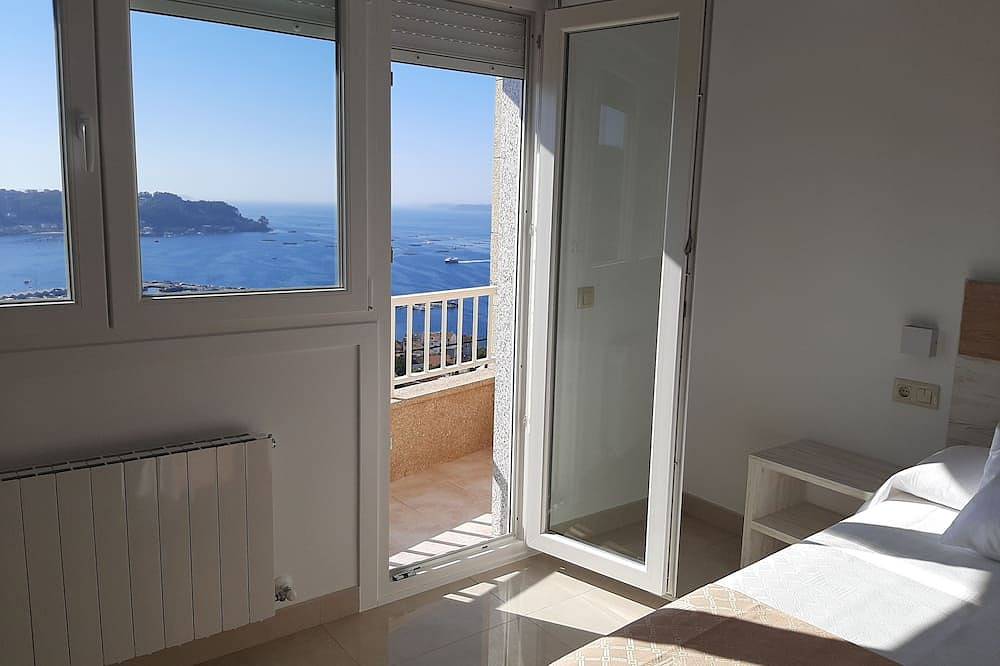 Appartement entier, 130 m2 apartment with incredible views of the Ria de Pontevedra in Bueu, Rías Baixas