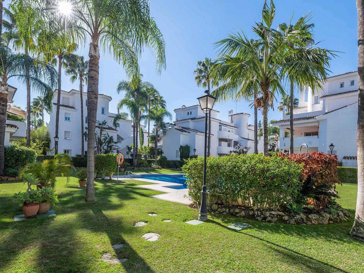 Entire apartment, Luxurious 2Br Retreat with Pool, Terrace & Bbq in Puerto Banús, Marbella in Nueva Andalucia Golf Valley, Marbella