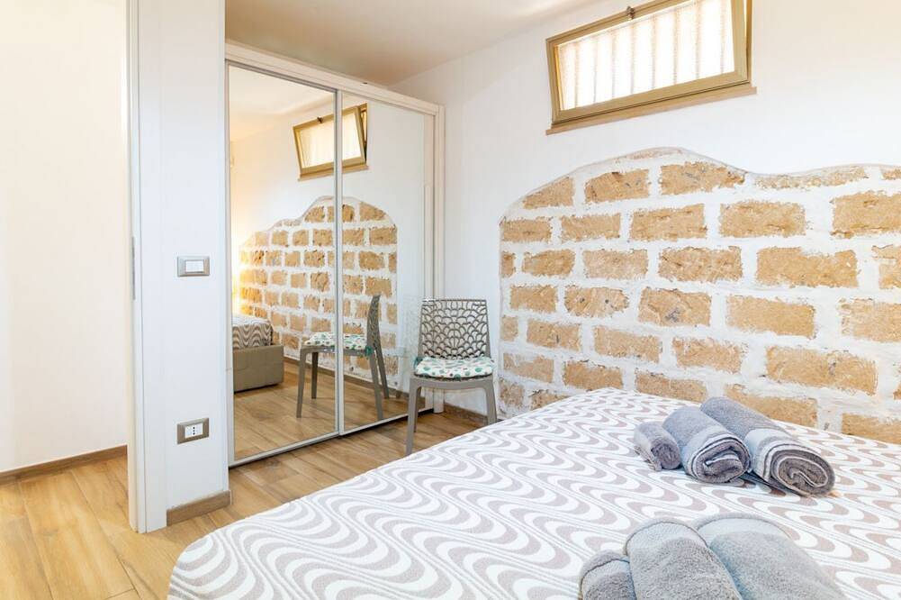 Ganze Wohnung, Platz, Komfort und Entspannung in Mandriola, nur wenige Schritte vom Meer entferntentdecke das Apartment Conchiglia, eine geräumige und komfortable Dreizimmerwohnung in Mandriola, nur 3 Gehminuten vom Strand entfernt – ideal für alle, die einen erhol in Mandriola, Sardinien
