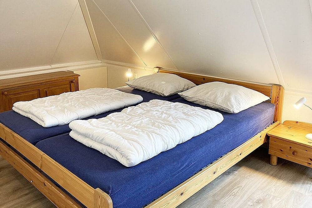 5 Gehminuten zum Strand: Komfortables Ferienhaus mit Garten, Veranda und Sauna in De Banjaard, Kamperland