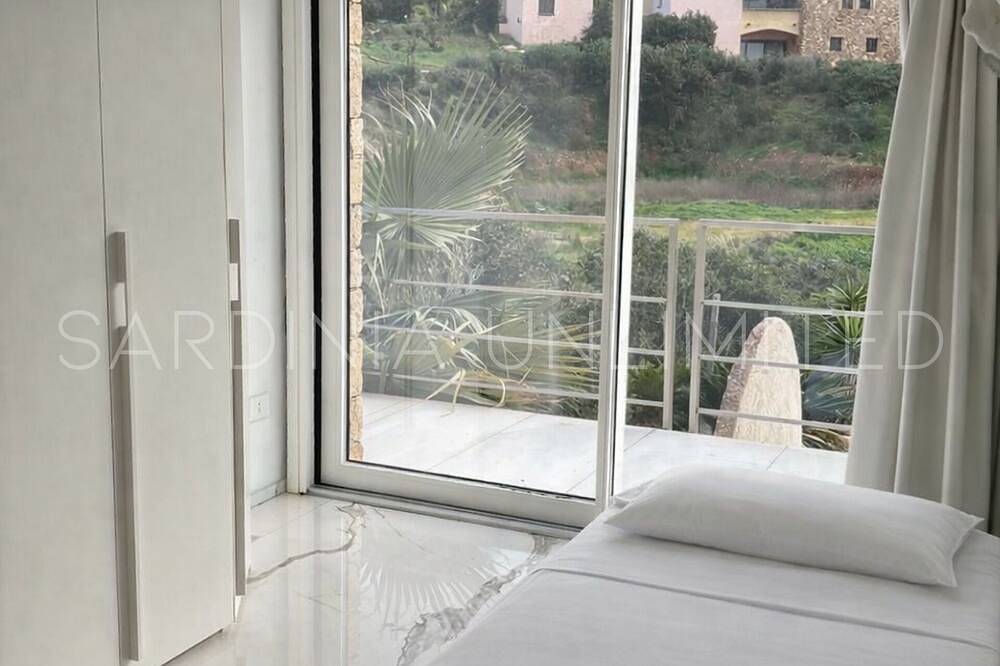 Villa Ismarea: un elegante rifugio con piscina privata a pochi passi dal mare - Sardinia Unlimited in La Marinedda, Trinità d'Agultu e Vignola