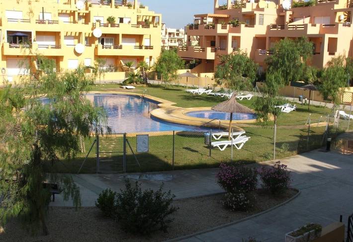 Entire apartment, Homely Apartment in El Faro with Pool, Terrace, Balcony, A/C & Wi-Fi in Playas de Vera, Vera