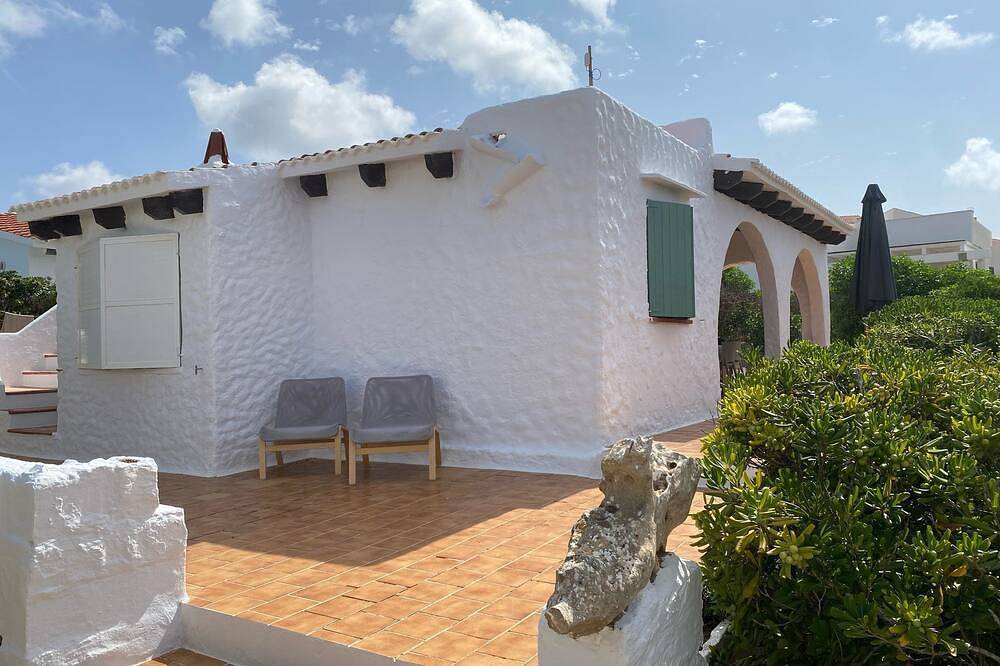 Magnificent villa a few meters from the sea with a private cove in Torret de Baix, Sant Lluís