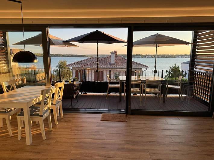 Ferienwohnung für 4 Personen, mit Ausblick und Balkon sowie Seeblick - 1