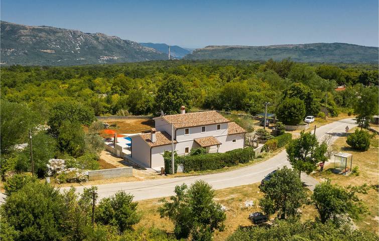 Ferienhaus für 7 Personen, mit Garten