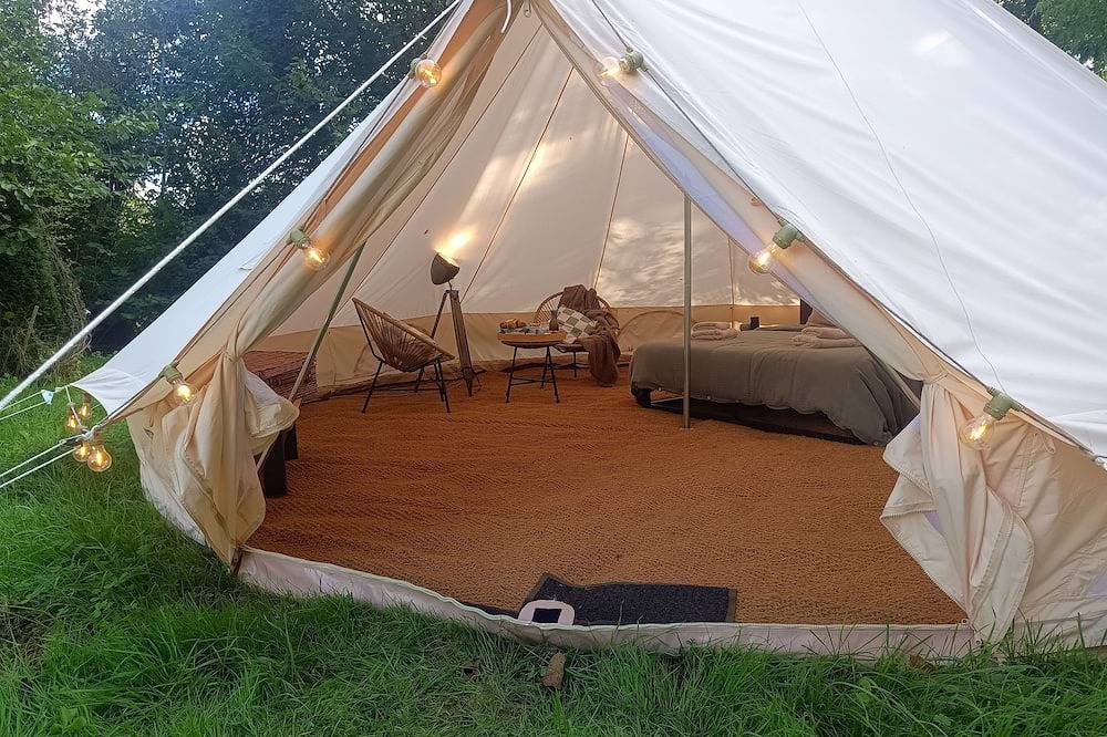 A Comfortable Nature Getaway at Moulin de Saza: Glamping Tent with a Pool in Le Vigeant, Vienne