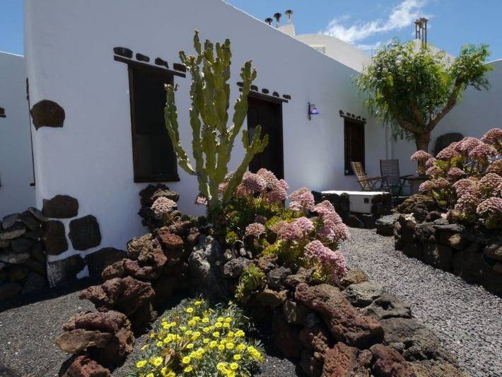 Casa de vacaciones para 3 personas, con Terraza además de Jardín y Piscina en Guatiza