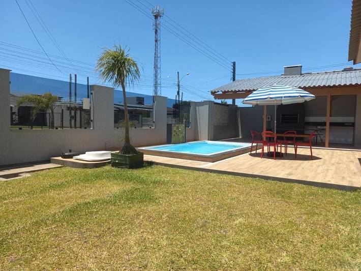 Casas e apartamentos de temporada para 16 pessoas, com jardim e vista e ainda piscina em Arroio do Sal