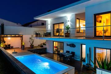Villa pour 14 personnes, avec jardin et balcon à Comporta