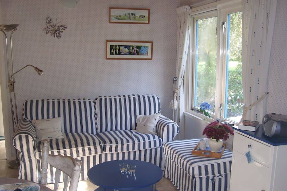 Our holiday home for those seeking tranquility stands on an island surrounded by nature in Groene Hart