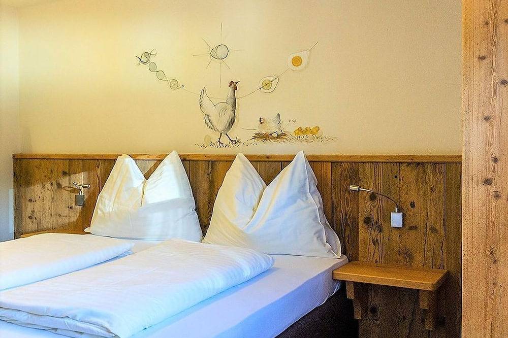 \"Schlafen im Hexenwasser\" Vierbettzimmer - Alpengasthof Hochsöll in Söll, Kaisergebirge