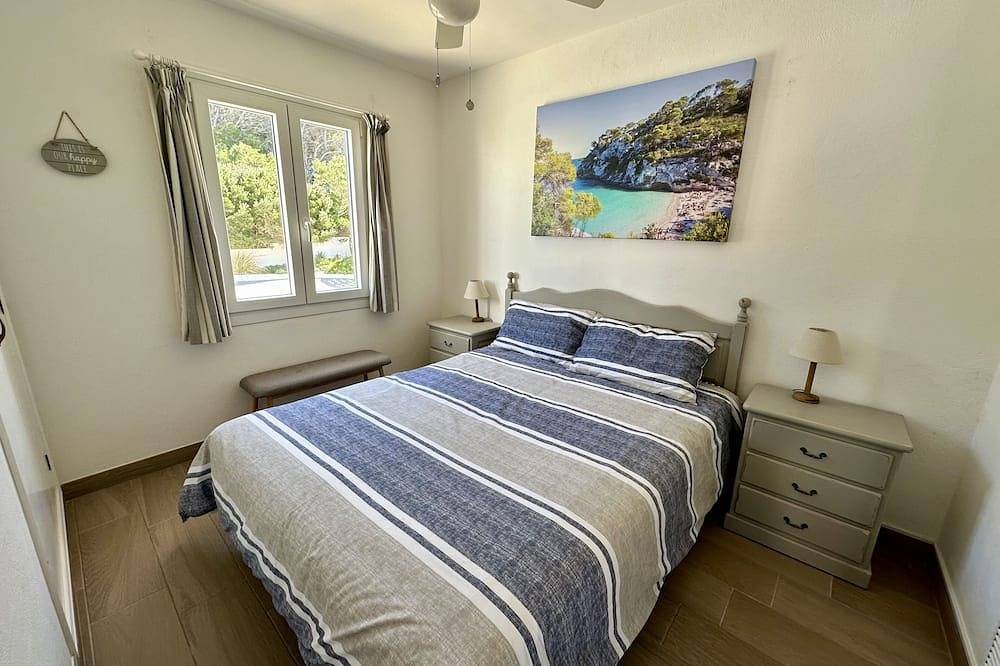 250m from the stunning sandy beach, terrace overlooking the large pool. in Arenal d'en Castell, Es Mercadal