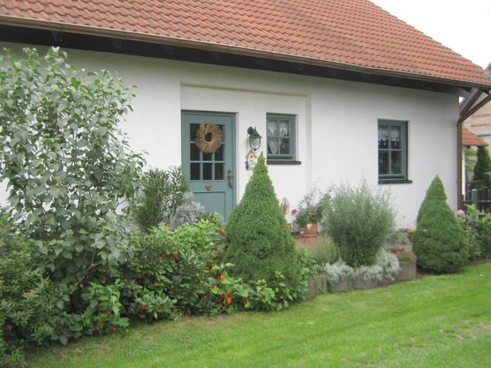 Ferienwohnung für 3 Personen, mit Balkon und Terrasse sowie Garten und Sauna in Doberschütz