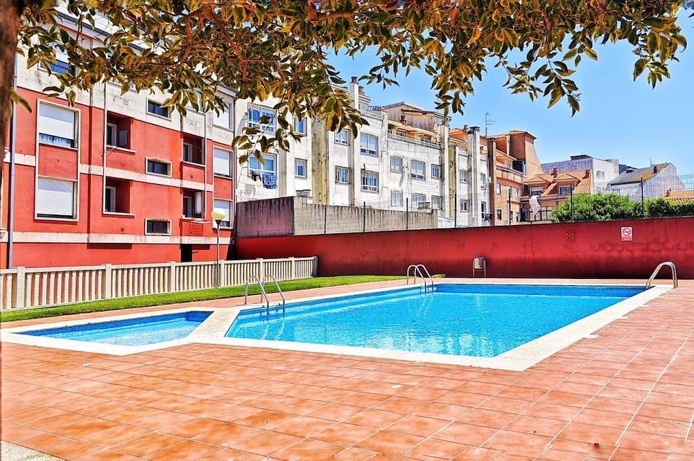 Apartamento entero, Desconectaengalicia La Perla Estándar, piscina y parking in Praia de Caneliñas (Sanxenxo), Sanxenxo