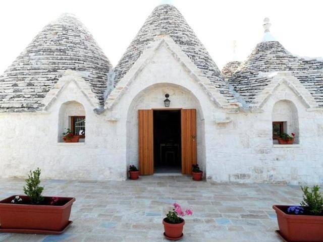 Trullo per 5 persone, con piscina e panorama nonché giardino, adatto a famiglie con bambini a Monopoli